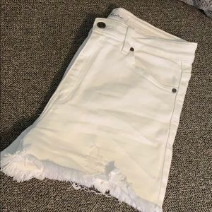 White KanCan distressed shorts